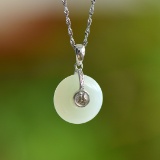 An Exquisite Sterling Silver Inlaid White Jade Pendant