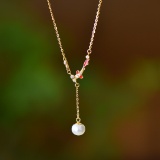 An Exquisite Sterling Silver-Gold Plated Inlaid White Jade Pendant