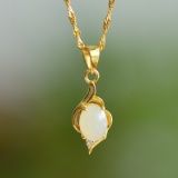 An Exquisite Sterling Silver-Gold Plated Inlaid White Jade Pendant
