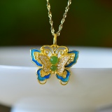 An Exquisite Sterling Silver-Gold Plated Inlaid White Jade Pendant
