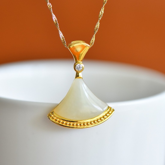 An Exquisite Sterling Silver-Gold Plated Inlaid White Jade Pendant