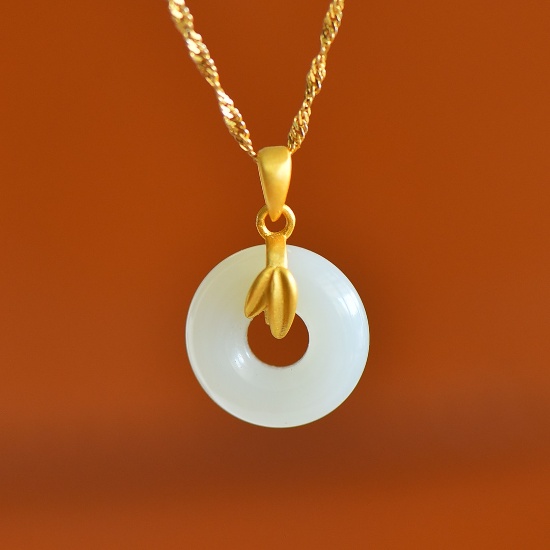 An Exquisite Sterling Silver-Gold Plated Inlaid White Jade Pendant
