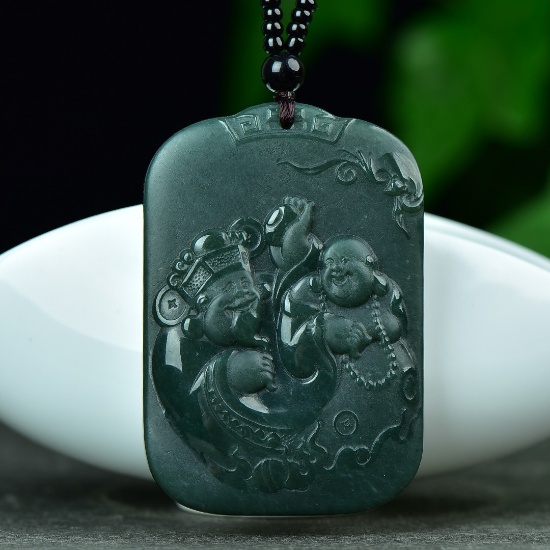 An Exquisite Sapphire Buddha Pattern Pendant