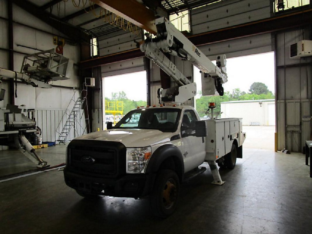 (Conway, AR) Altec AT40M, Articulating & Telescopic Material Handling Bucket Truck mounted behind ca