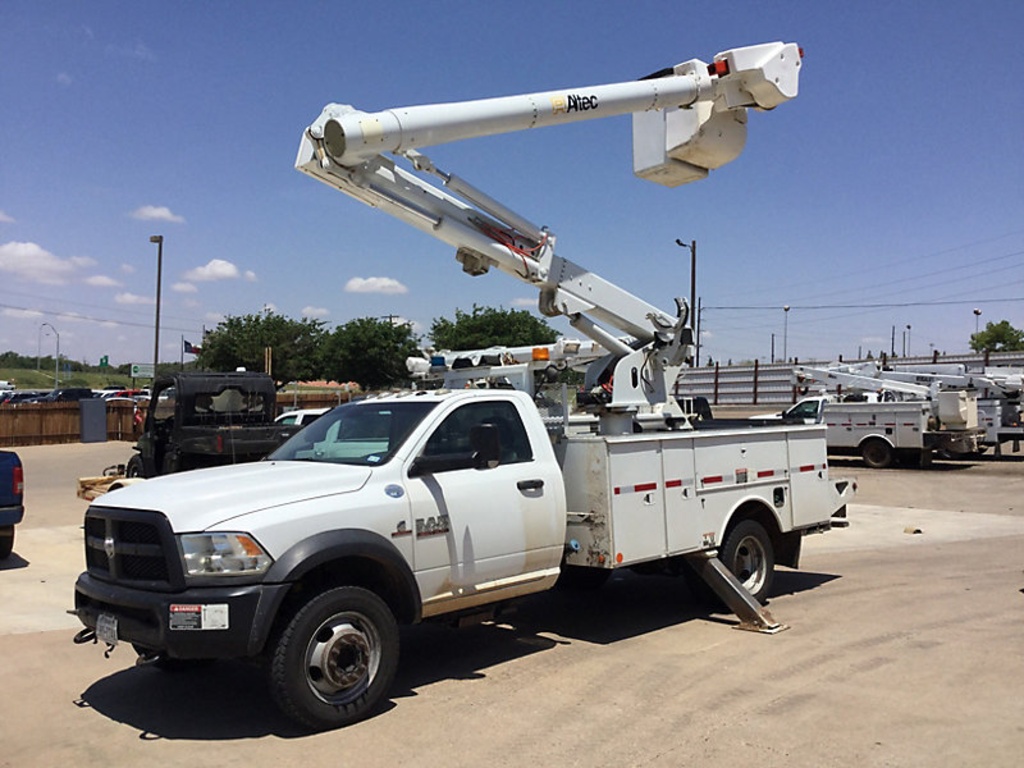 (Lubbock, TX) Altec L37MR, Over-Center Material Handling Bucket Truck center mounted on 2014 Ram W55