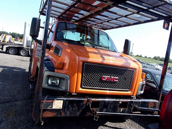 (Ashland, OH) Altec LRV-57RM, Over-Center Bucket Truck rear mounted on 2008 GMC C7500 Flatbed/Utilit