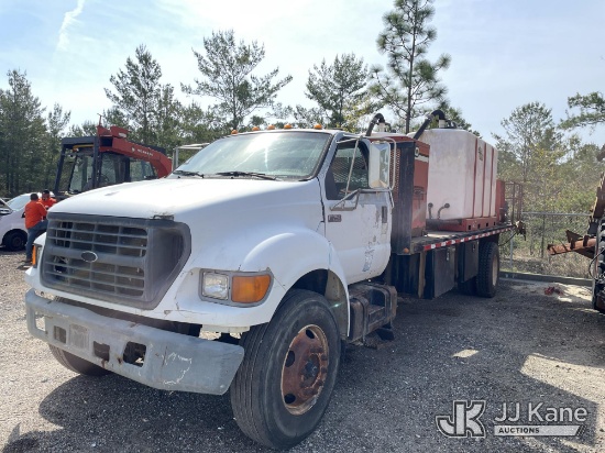 (Defuniak Springs, FL) 2000 Ford F750 Flatbed Truck, (Utility Owned) Runs & Moves) (Seller States: B