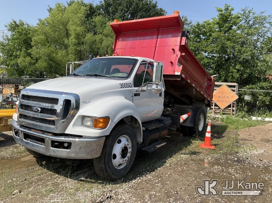 (Olathe, KS) 2013 Ford F750 Dump Truck Runs, Moves, & Bed Operates) (Jump To Start,, Damage To Curb 