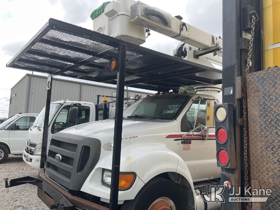 (Memphis, TN) Terex XT56, Over-Center Bucket Truck mounted behind cab on 2015 Ford F-750 Chipper Dum
