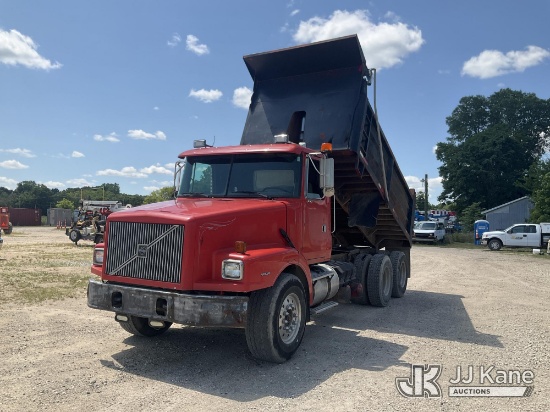 (Charlotte, MI) 1996 Volvo WG T/A Dump Truck Runs, Moves & Dump Operates) (Interior Defects - Stereo