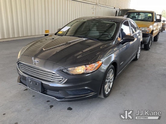 (Jurupa Valley, CA) 2017 Ford Fusion Hybrid 4-Door Sedan Runs & Moves)(Vehicle previously used with