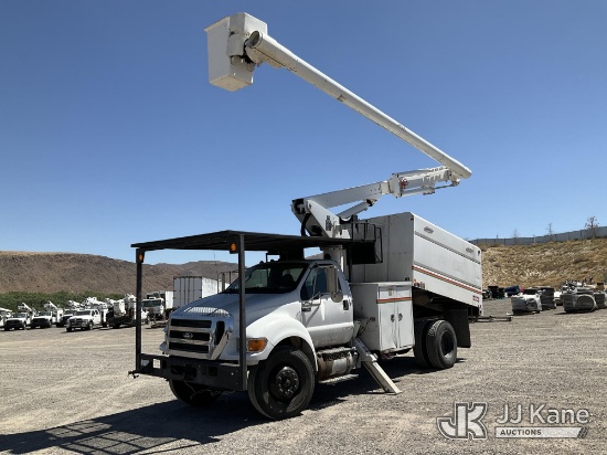 (Sparks, NV) Altec LR756, Over-Center Bucket Truck mounted behind cab on 2013 Ford F-750 Chipper Dum