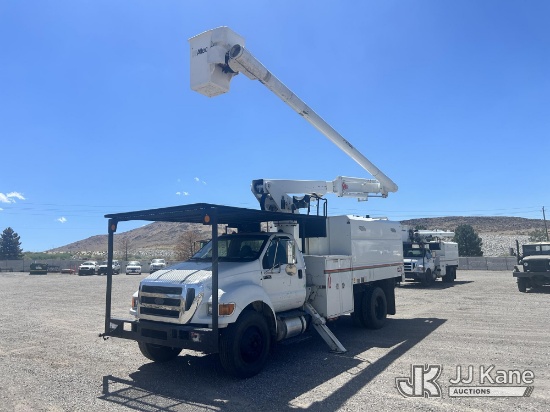 (Sparks, NV) Altec LR756, Over-Center Bucket Truck mounted behind cab on 2012 Ford F-750 Chipper Dum
