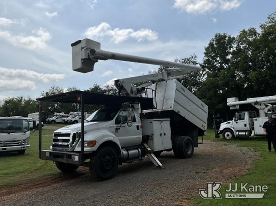 (Kodak, TN) Altec LR756, Over-Center Bucket Truck mounted behind cab on 2013 Ford F-750 Chipper Dump