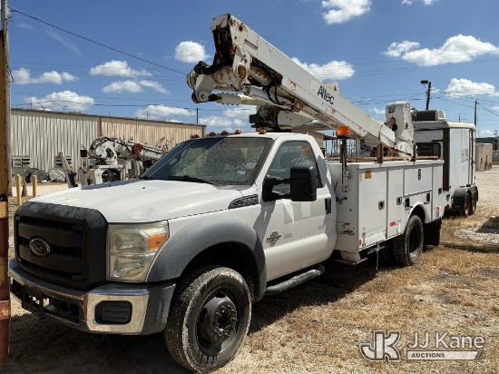 (Olmito, TX) Altec AT40M, Articulating & Telescopic Material Handling Bucket Truck mounted behind ca