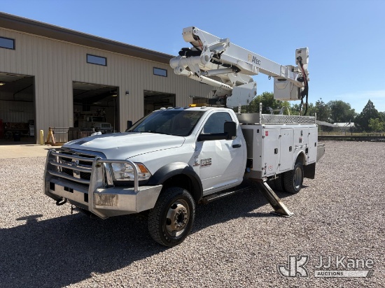 (Newell, SD) Altec AT41M, Articulating & Telescopic Material Handling Bucket Truck mounted behind ca