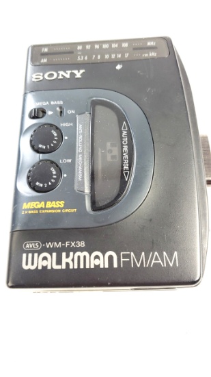 Vintage Black Sony Walkman and Am/FM Radio