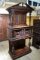 FLORENTINE CARVED WALNUT BLIND FRONT CURIO CABINET