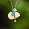 Exquisite Sterling Silver-Gold Plated Inlaid White Jade Pendant