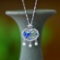 An Exquisite Sterling Silver Inlaid White Jade Pendant