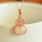 Exquisite Sterling Silver-Gold Plated Inlaid White Jade Pendant