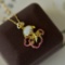 An Exquisite Sterling Silver-Gold Plated Inlaid White Jade Pendant