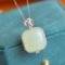 Exquisite Sterling Silver Inlaid White Jade Pendant