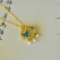 An Exquisite Sterling Silver-Gold Plated Inlaid White Jade Pendant