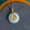 Exquisite Sterling Silver-Gold Plated Inlaid White Jade Pendant