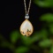 Exquisite Sterling Silver-Gold Plated Inlaid White Jade Pendant