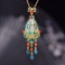 Exquisite Sterling Silver-Gold Plated Inlaid White Jade Pendant