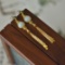 A Pair of Exquisite Sterling Silver-Gold Plated Inlaid White Jade Earrings