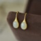 A Pair of Exquisite Sterling Silver-Gold Plated Inlaid White Jade Earrings
