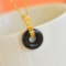 Exquisite Sterling Silver-Gold Plated Inlaid Black Jade Pendant