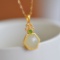 Exquisite Sterling Silver-Gold Plated Inlaid White Jade Pendant