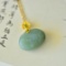 An Exquisite Sterling Silver-Gold Plated Inlaid Jade Pendant