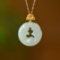 An Exquisite Sterling Silver-Gold Plated Inlaid White Jade Pendant