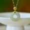An Exquisite Sterling Silver-Gold Plated Inlaid Jade Pendant