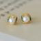 A Pair of Exquisite Sterling Silver-Gold Plated Inlaid Pearl Earrings