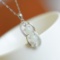 Exquisite Sterling Silver Inlaid White Jade Pendant