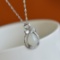 Exquisite Sterling Silver Inlaid White Jade Pendant