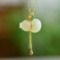Exquisite Sterling Silver-Gold Plated Inlaid White Jade Pendant