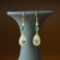 A Pair of Exquisite Sterling Silver-Gold Plated Inlaid White Jade Earrings