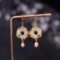 Exquisite Sterling Silver-Gold Plated Inlaid White Jade Earrings
