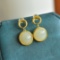 A Pair of Exquisite Sterling Silver-Gold Plated Inlaid White Jade Earrings