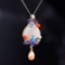 Exquisite Sterling Silver-Gold Plated Inlaid White Jade Pendant