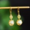 A Pair of Exquisite Sterling Silver-Gold Plated Inlaid White Jade Earrings