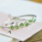 An Exquisite Sterling Silver Inlaid Jasper Bangle
