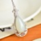 Exquisite Sterling Silver Inlaid White Jade Pendant