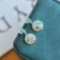 A Pair of Exquisite Sterling Silver Inlaid White Jade Earrings